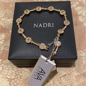 Nadri bracelet with high quality crystals in gold tone setting. NWT